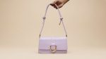 Minimalist U-Lock Shoulder Bag with Adjustable Knotted Strap - Image 3